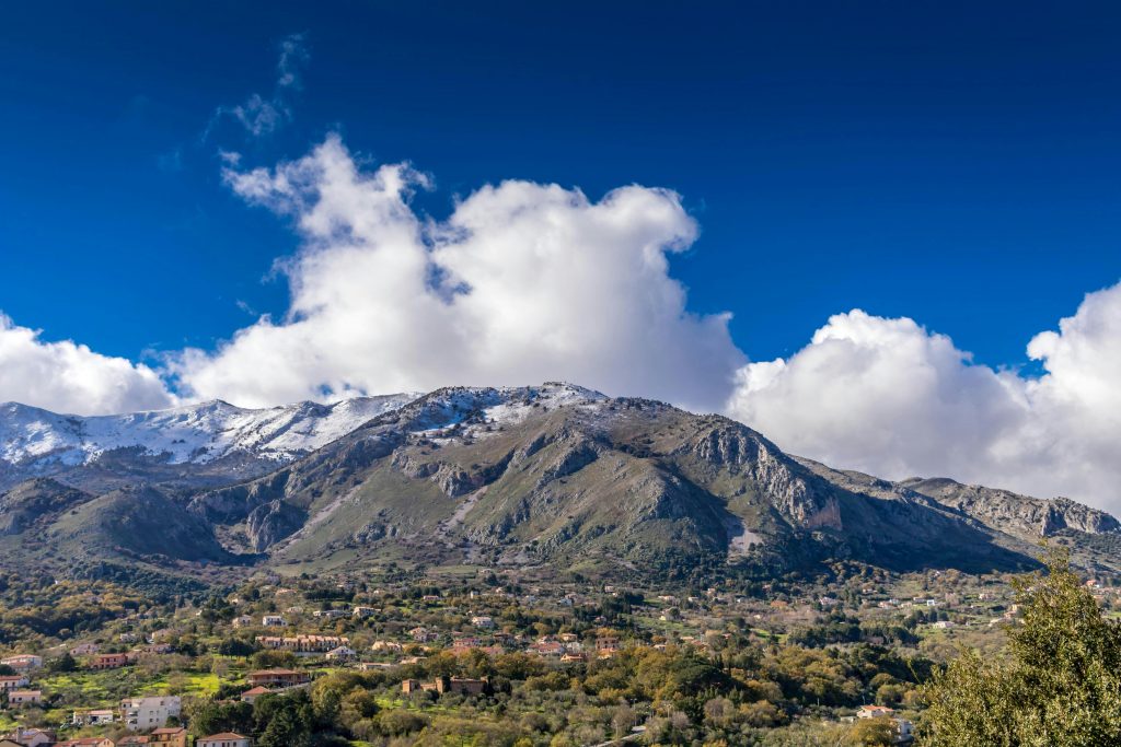 Breathtaking view of the Madonie mountain range near Castelbuono, Sicily, on a clear day.